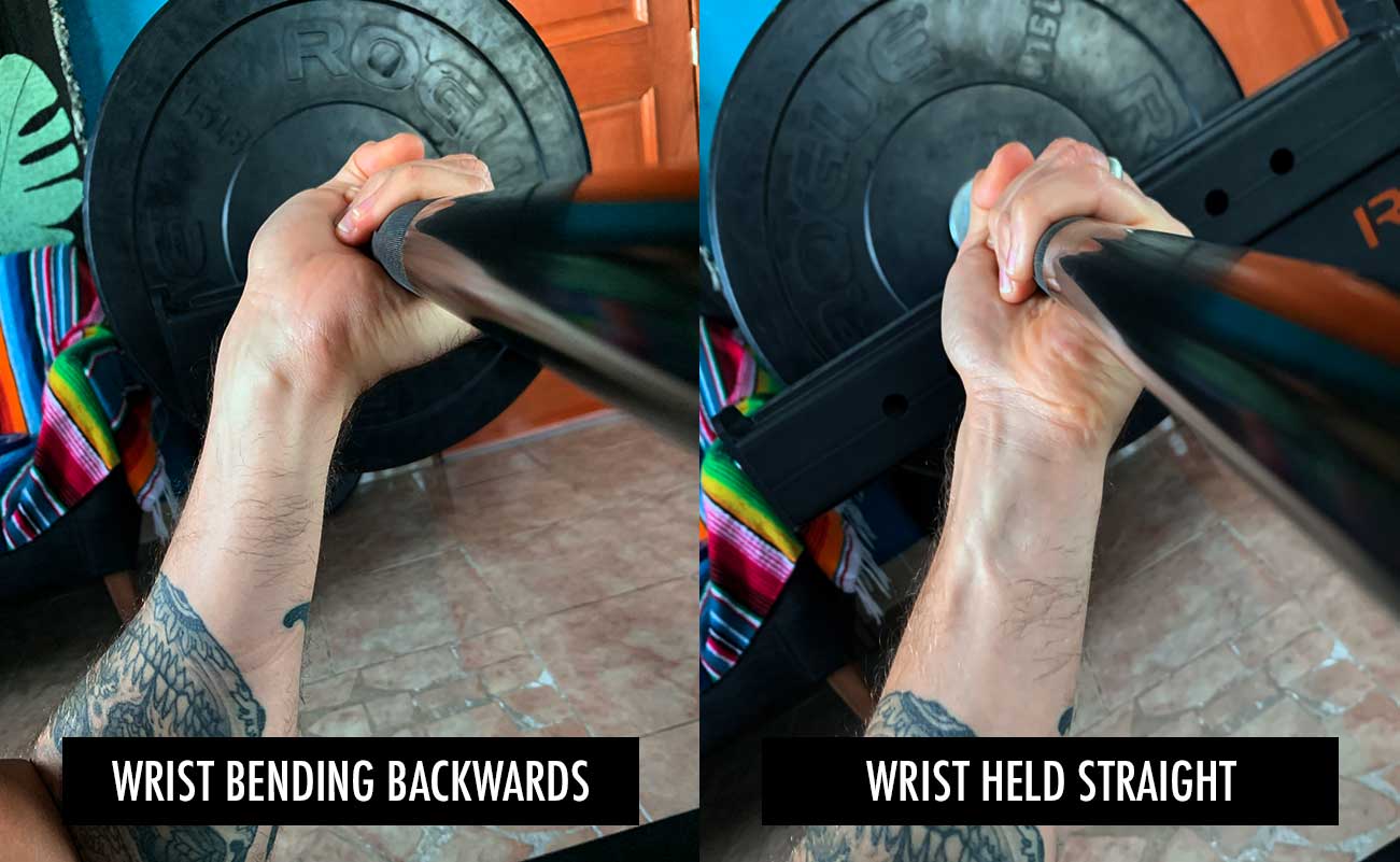 Photo showing how the wrist can bend backwards when doing the barbell bench press, causing pain or discomfort.